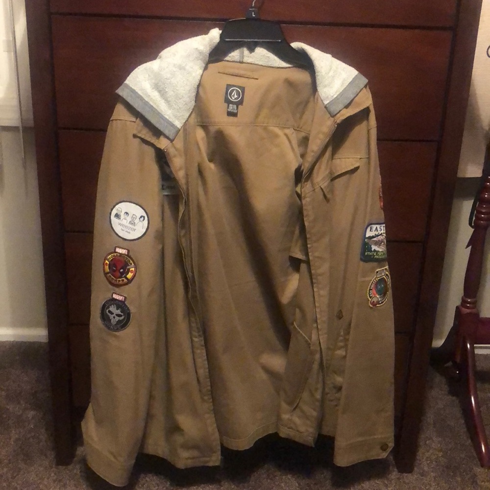 VOLCOM JACKET WITH VARIOUS POP CULTURE PATCHES
